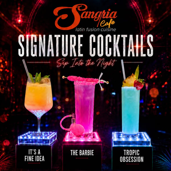 Three vibrant Sangria Cafe signature cocktails, garnished and presented on glowing stands.
